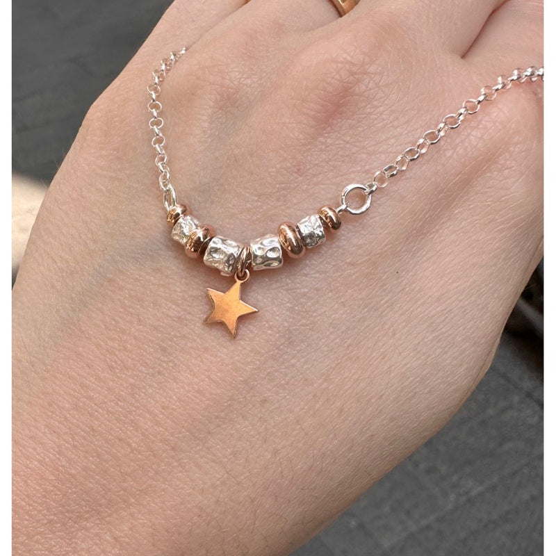 Collana rotelline con ciondolo