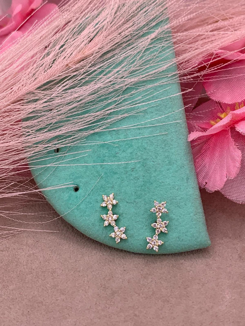 Orecchini tre fiori oro