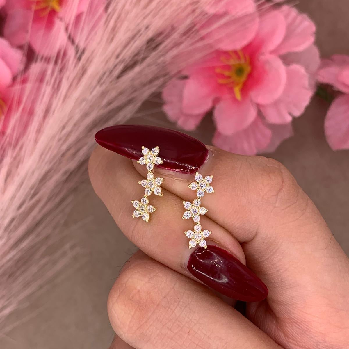 Orecchini tre fiori oro