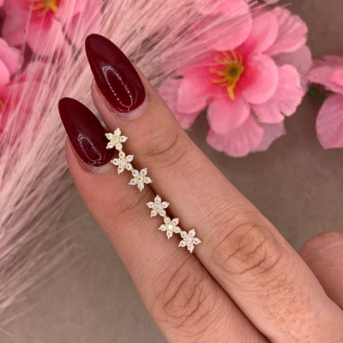 Orecchini tre fiori oro