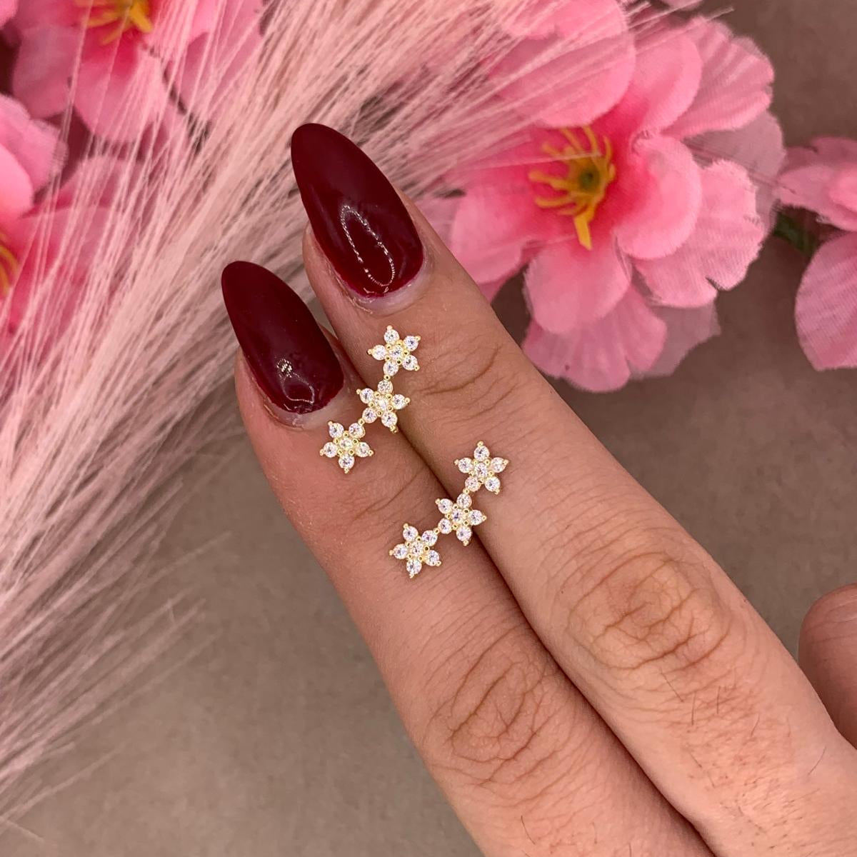 Orecchini tre fiori oro