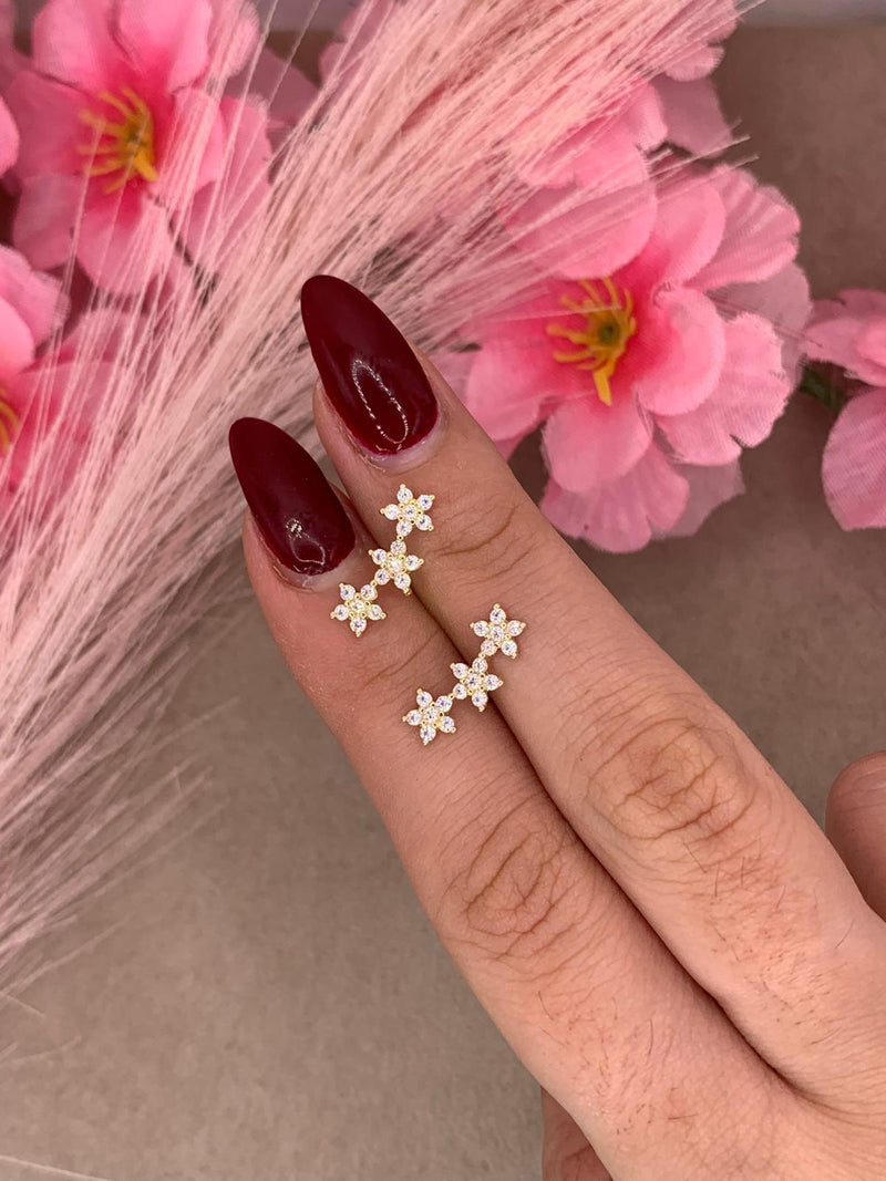 Orecchini tre fiori oro