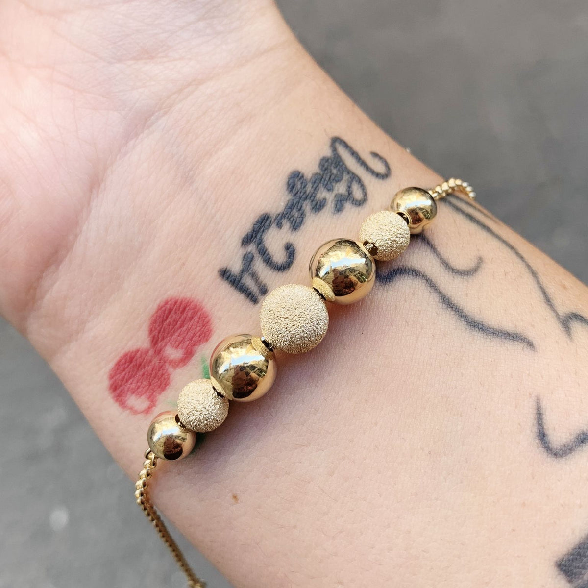 Bracciale sfere gold