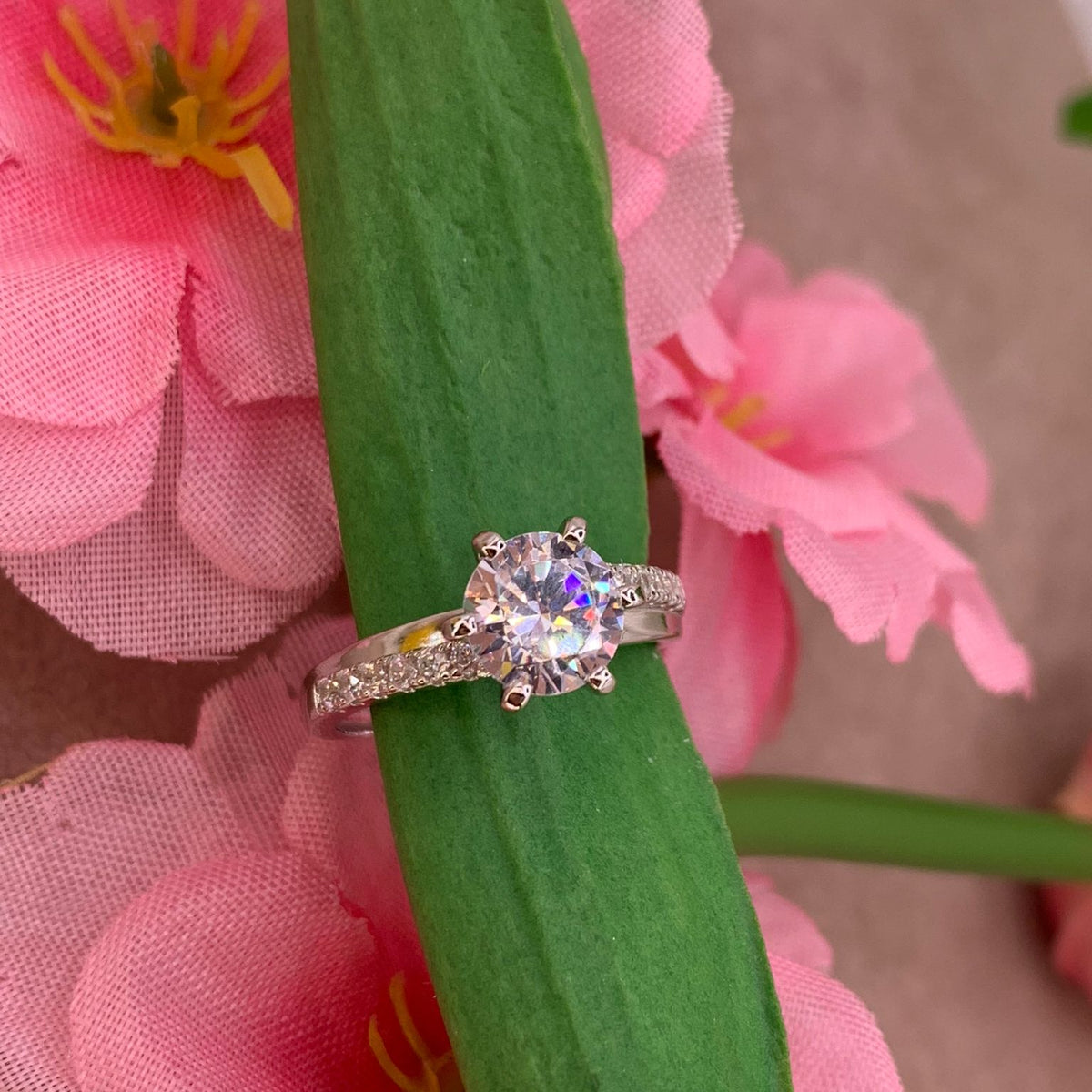 Anello solitario doppia fascia