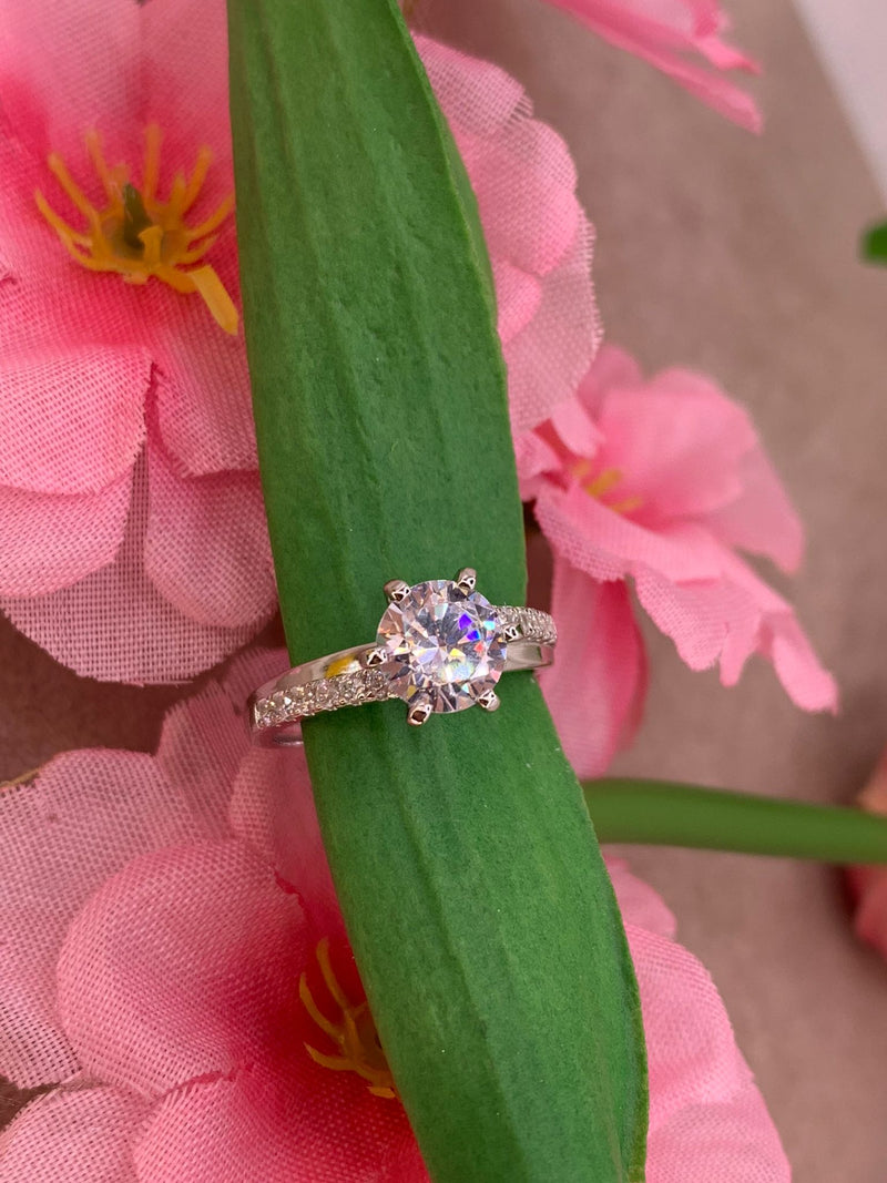 Anello solitario doppia fascia