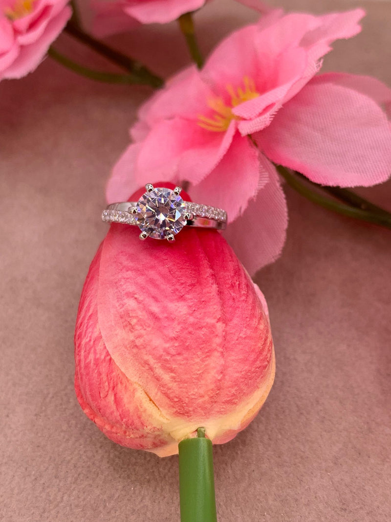 Anello solitario doppia fascia