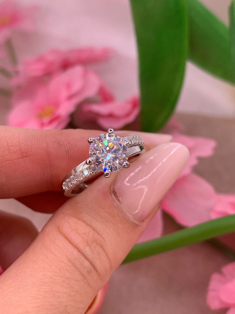 Anello solitario doppia fascia