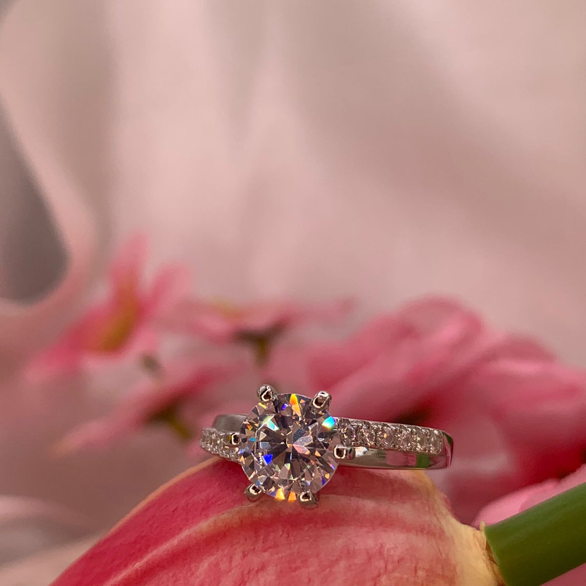 Anello solitario doppia fascia
