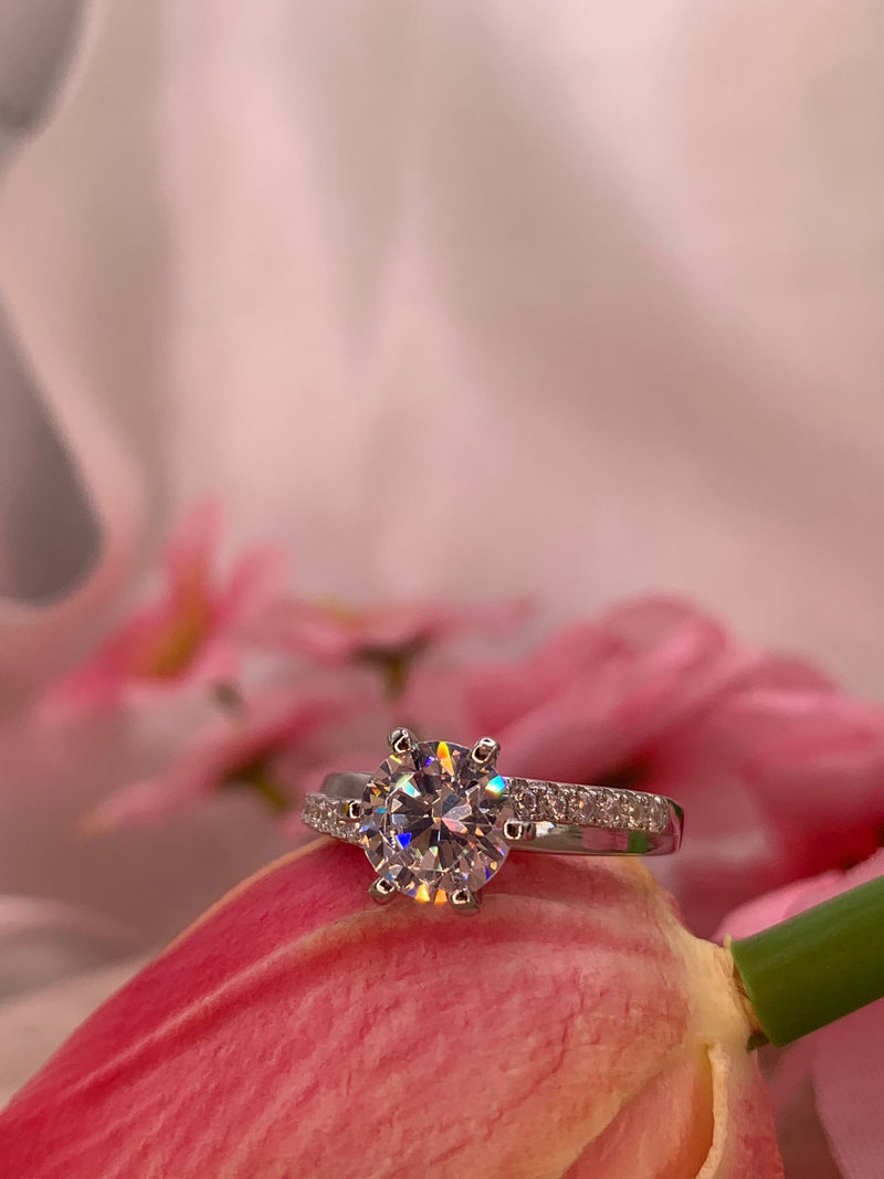 Anello solitario doppia fascia