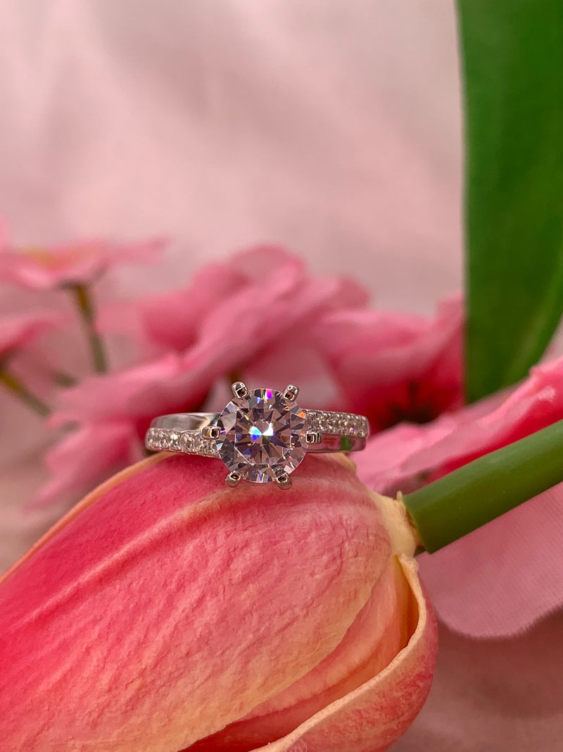 Anello solitario doppia fascia