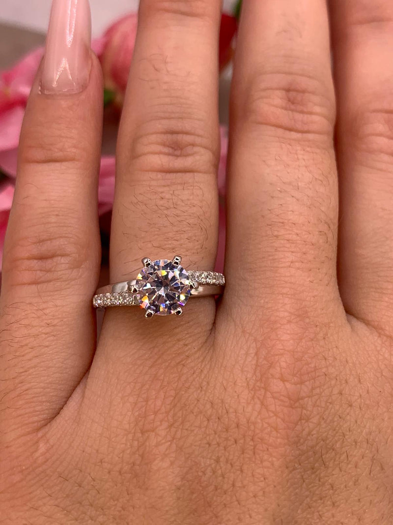 Anello solitario doppia fascia