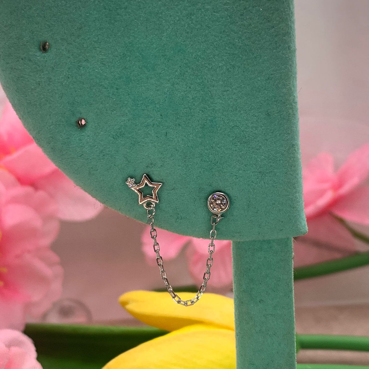 Orecchino chain star