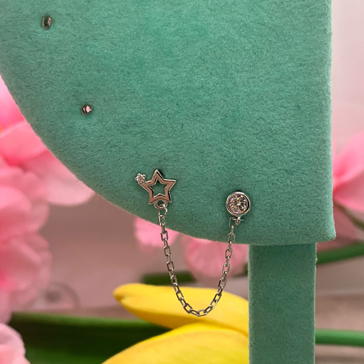 Orecchino chain star