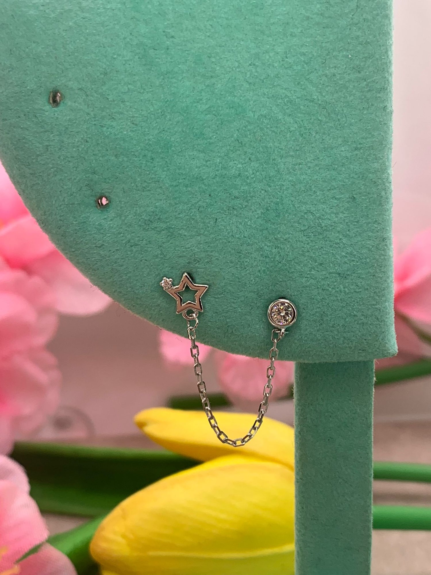 Orecchino chain star