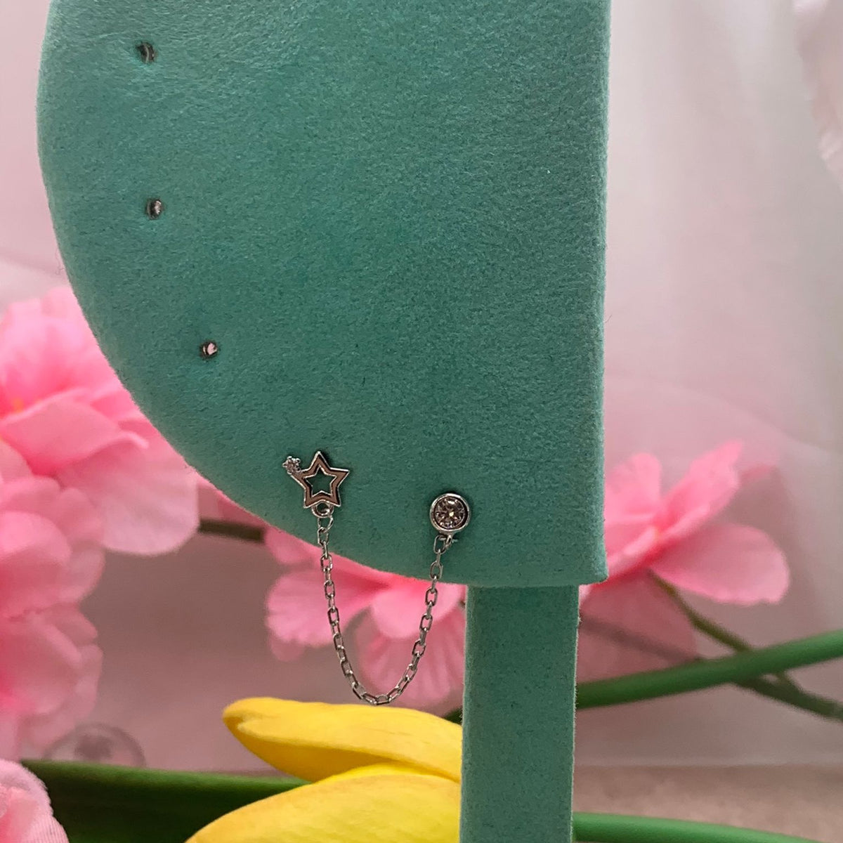 Orecchino chain star