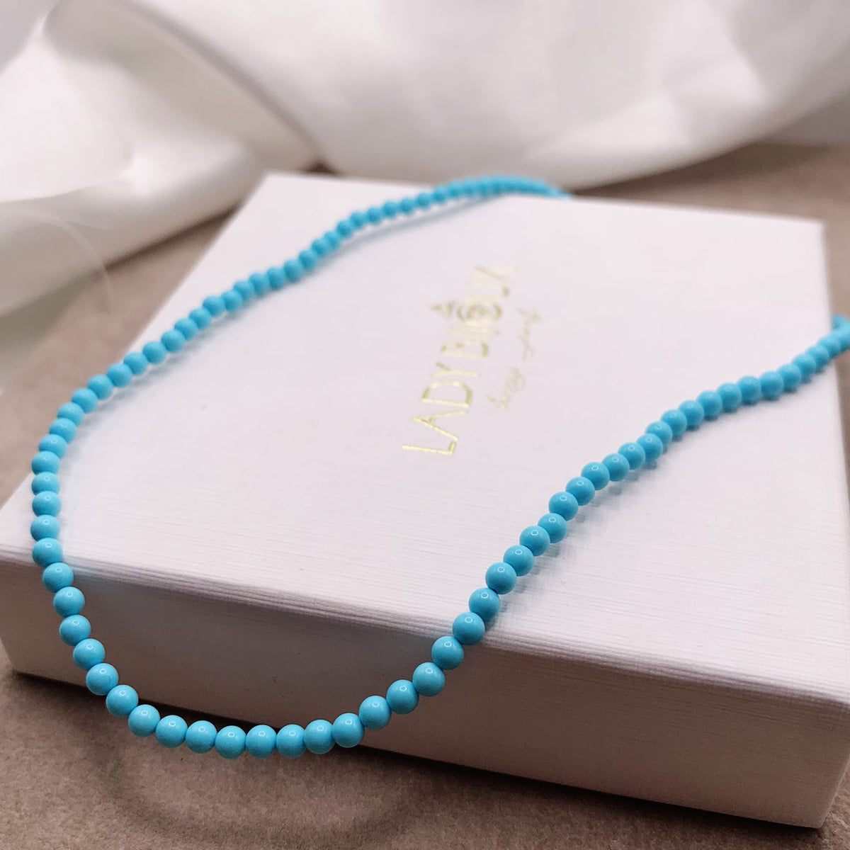 Collana mini turchesina
