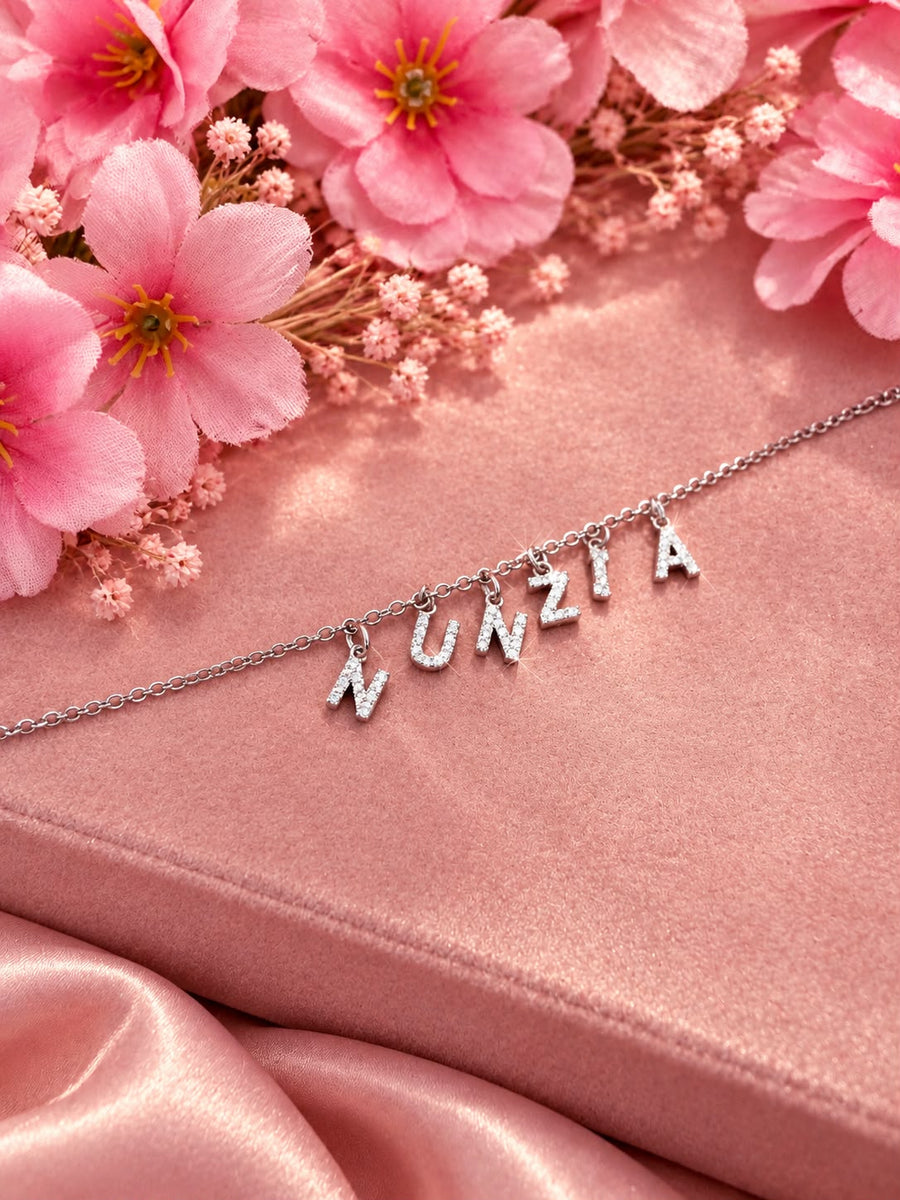 Bracciale lettere pendenti